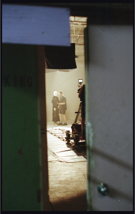 Behind the scenes during Curtain's filming